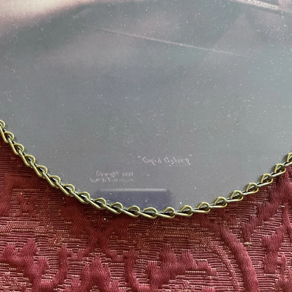 Vintage Cupid Oval Print with Chain Frame *Asleep* by M.B. Parkinson Flue Co.